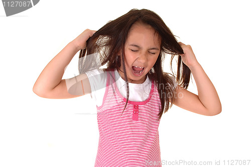 Image of Girl pulling her hair.