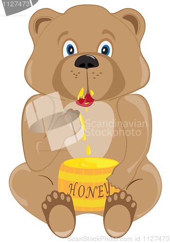 Image of Baby Bear Eating Honey