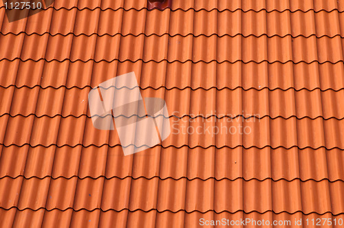 Image of Old red tile roof. A background