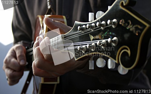 Image of Playing guitar