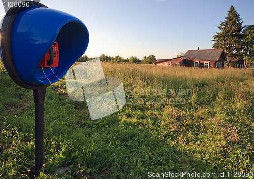 Image of modern phone in old village