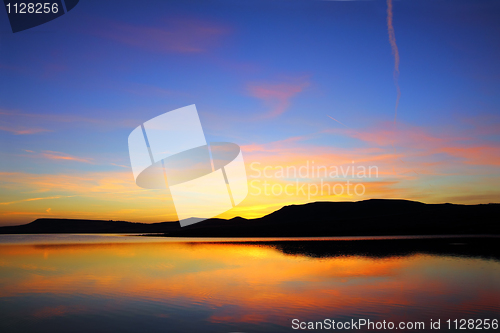Image of  morning lake with mountain before sunrise