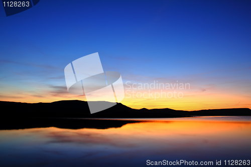 Image of  morning lake with mountain before sunrise