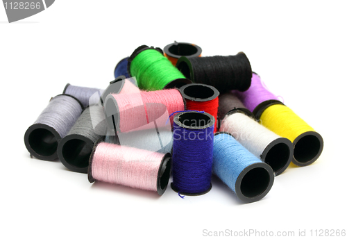 Image of lot of colored thread spools