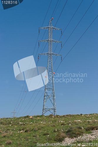 Image of Two steel supports of overhead power transmission line in perspective