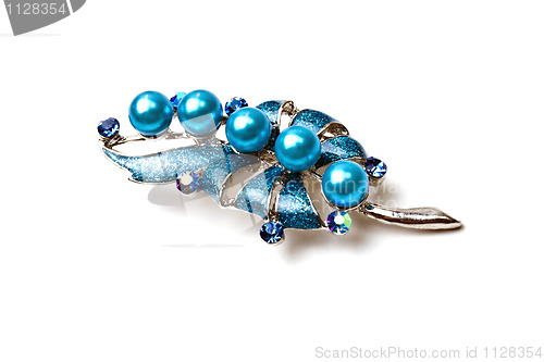 Image of Beautiful blue brooch isolated on white