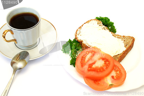 Image of breakfast with bread, tomatoes and parsley