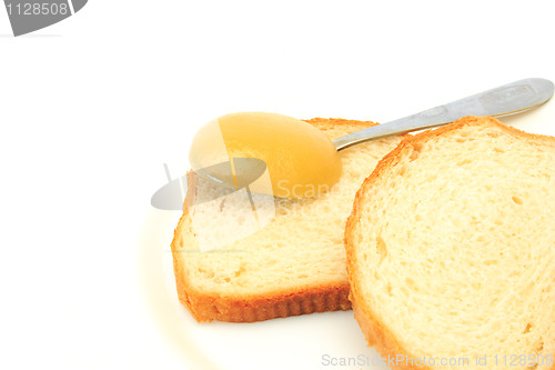 Image of white bread with a honey