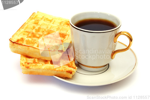 Image of white cup of coffee with waffle