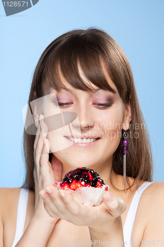 Image of Pretty girl with cake