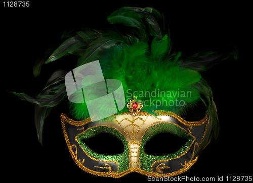 Image of Green Venetian mask on black