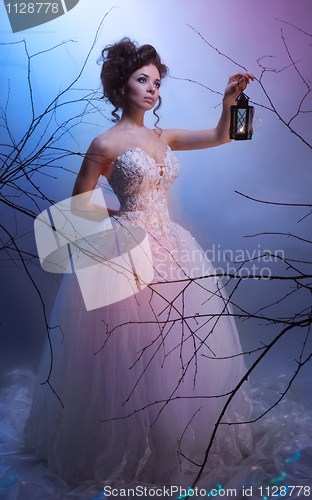 Image of Bride dream walking whit a lantern in