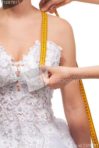 Image of Measuring the distance from shoulder to breast