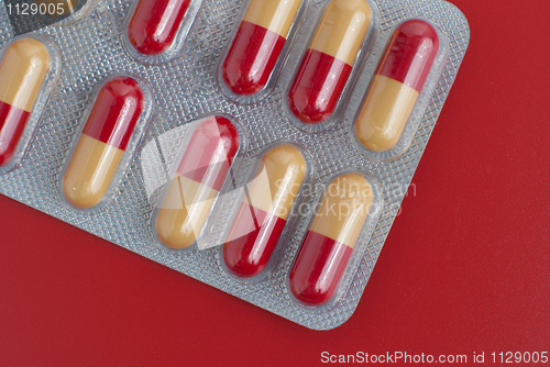 Image of Red and yellow pills