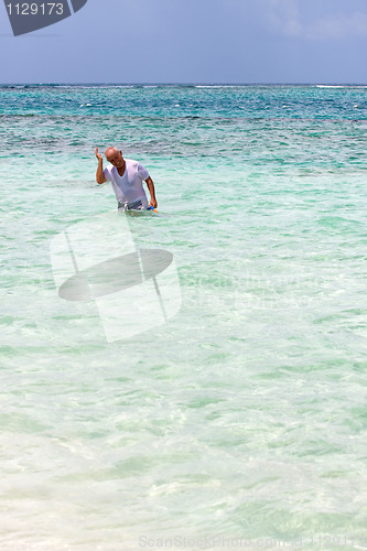 Image of Senior Citizen Snorkeling in Tropical Waters