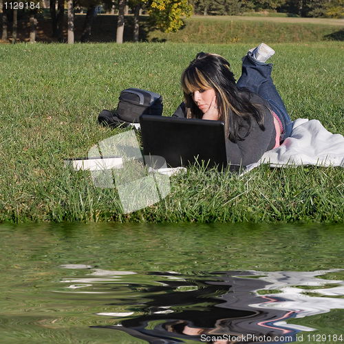 Image of Woman Using a Laptop