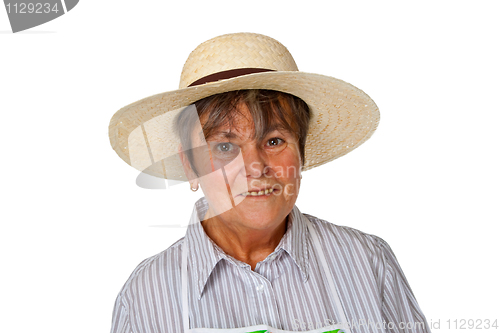Image of Female senior with straw hat