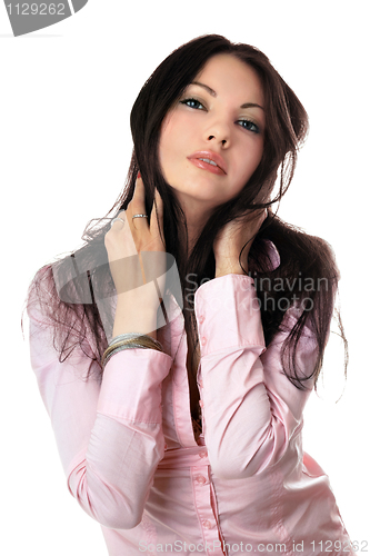 Image of Portrait of attractive young woman in pink shirt