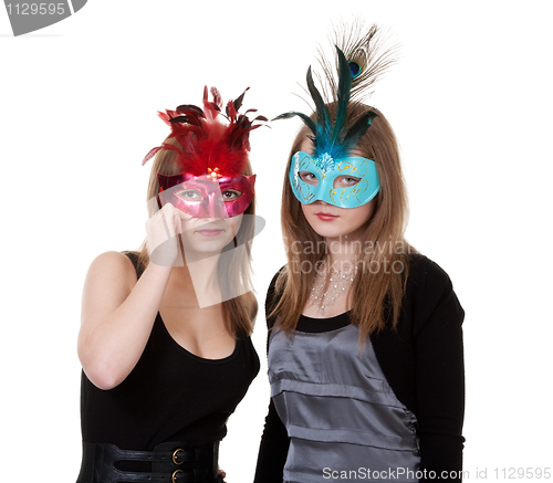 Image of two girl in the masquerade mask