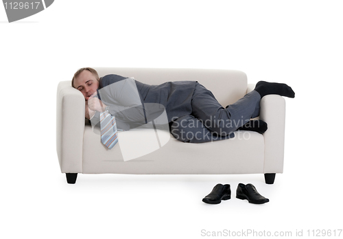 Image of businessman sleeping on a sofa