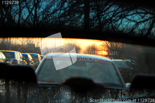 Image of Sunset in car mirror