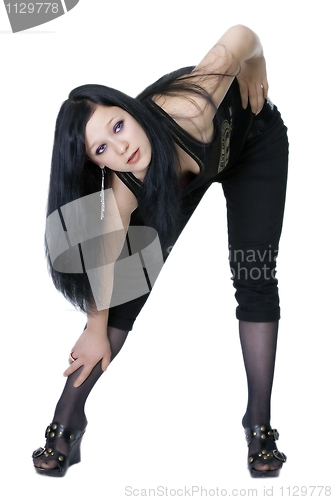 Image of The beautiful brunette in a sexual pose