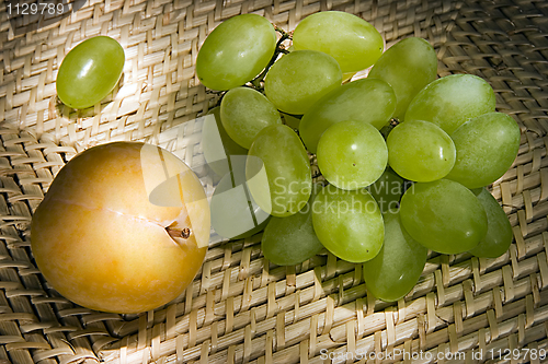 Image of Still-life with grapes and plum