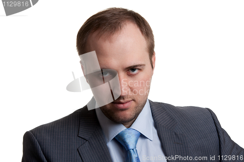 Image of portrait of an unshaven businessman