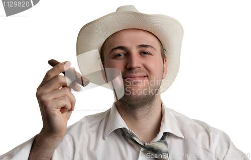 Image of man in a hat with a cigar