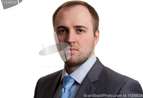 Image of portrait of an unshaven businessman