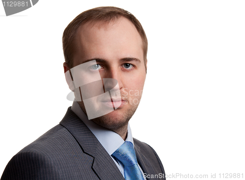 Image of portrait of an unshaven businessman