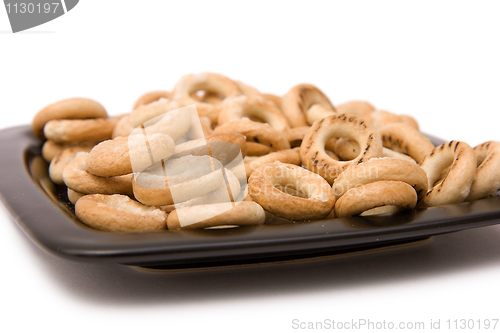 Image of Salty drying on a black square plate