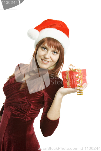 Image of Christmas gift in hands of the woman