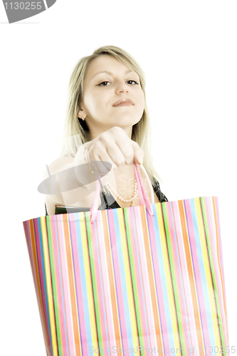 Image of The happy girl with package