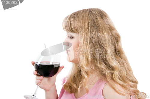 Image of The young woman with a wine glass