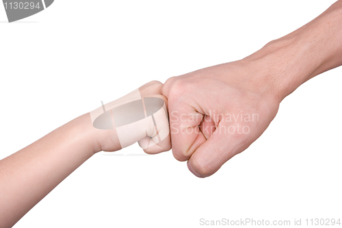 Image of Fist of the man and the child