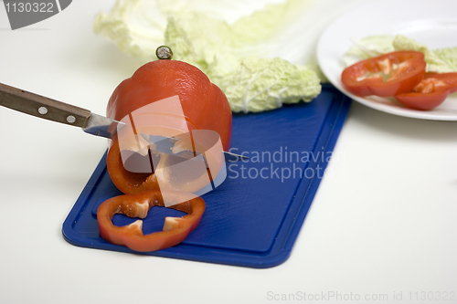 Image of Red pepper on a chopping board