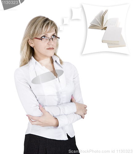 Image of The blonde in glasses thinks of books