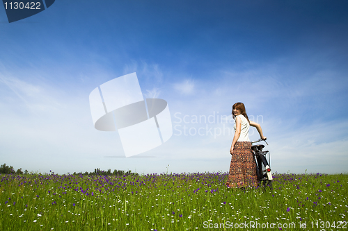 Image of Girl with a bicycle