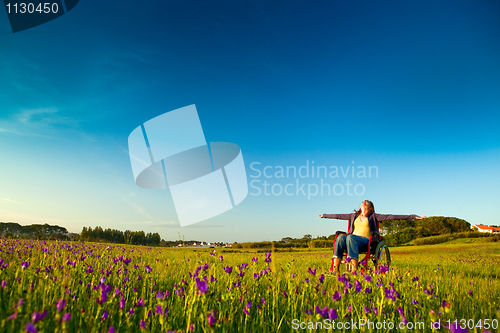 Image of Handicapped woman on wheelchair