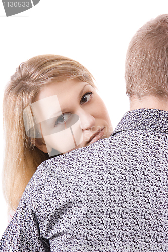 Image of Head of the young blonde on shoulder of the young man