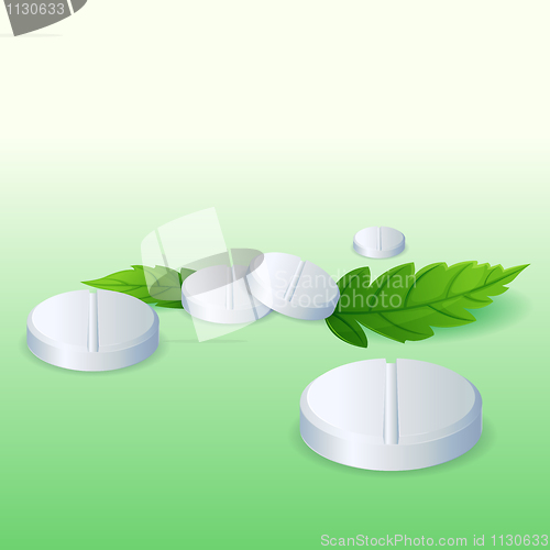 Image of pills with leaf