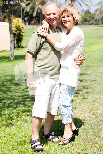 Image of Affectionate senior couple embracing