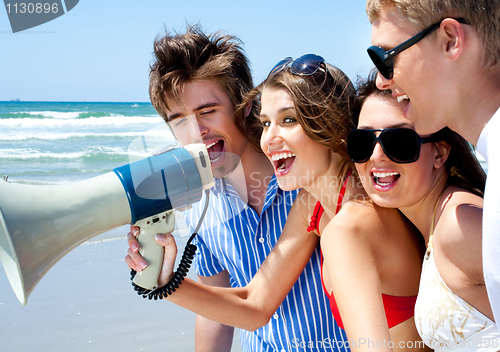 Image of Teenagers shouting through megaphone