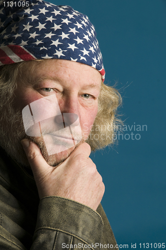 Image of handsome middle age man flag bandana leather jacket