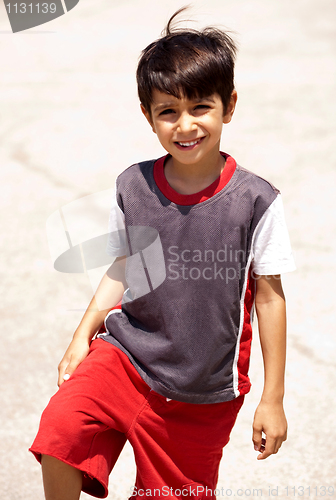 Image of Young boy posing in style