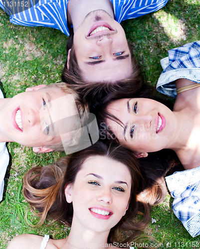 Image of Young friends forming a circle