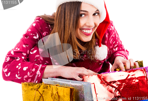 Image of lady opening christmas gifts