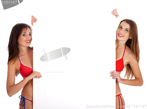 Image of Girls in bikini holding a sign board