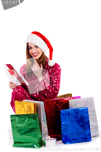 Image of young lady reading christmas card